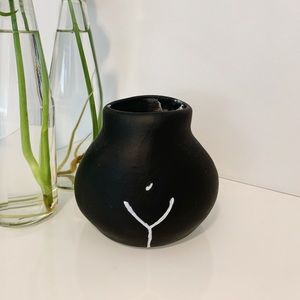 Female figure ceramic vase